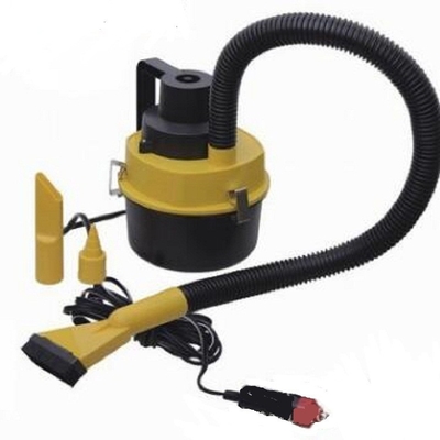 Aspirateur automatique jaune tenu dans la main d'aspirateur d'aspirateur de DC12V