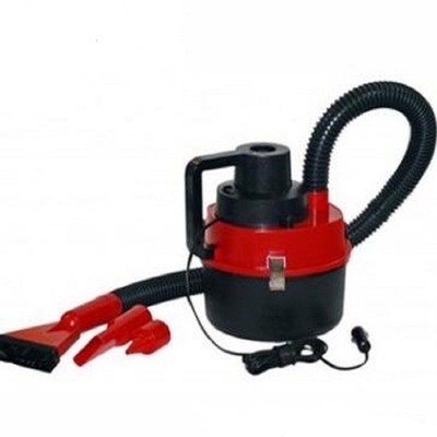 Un bon prix. Aspirateur humide ou sec de voiture avec l'aspirateur automatique rouge tenu dans la main d'aspirateur d'allumeur de cigarette en ligne